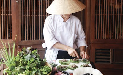 Six Senses Vietnam cuisine woman preparing traditional cuisine