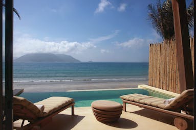 Six Senses Vietnam deluxe ocean front villa exterior infinity pool private terrace beach