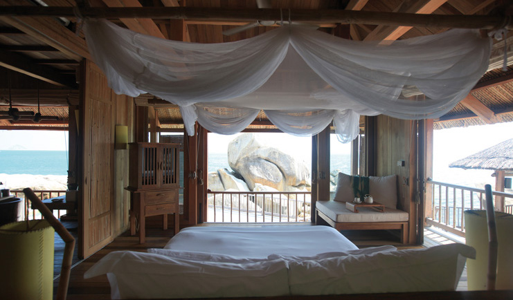 Six Senses Ninh Van Bay Vietnam presidential villa bedroom beach and rock view