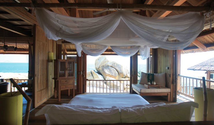 Six Senses Ninh Van Bay Vietnam presidential villa bedroom beach and rock view