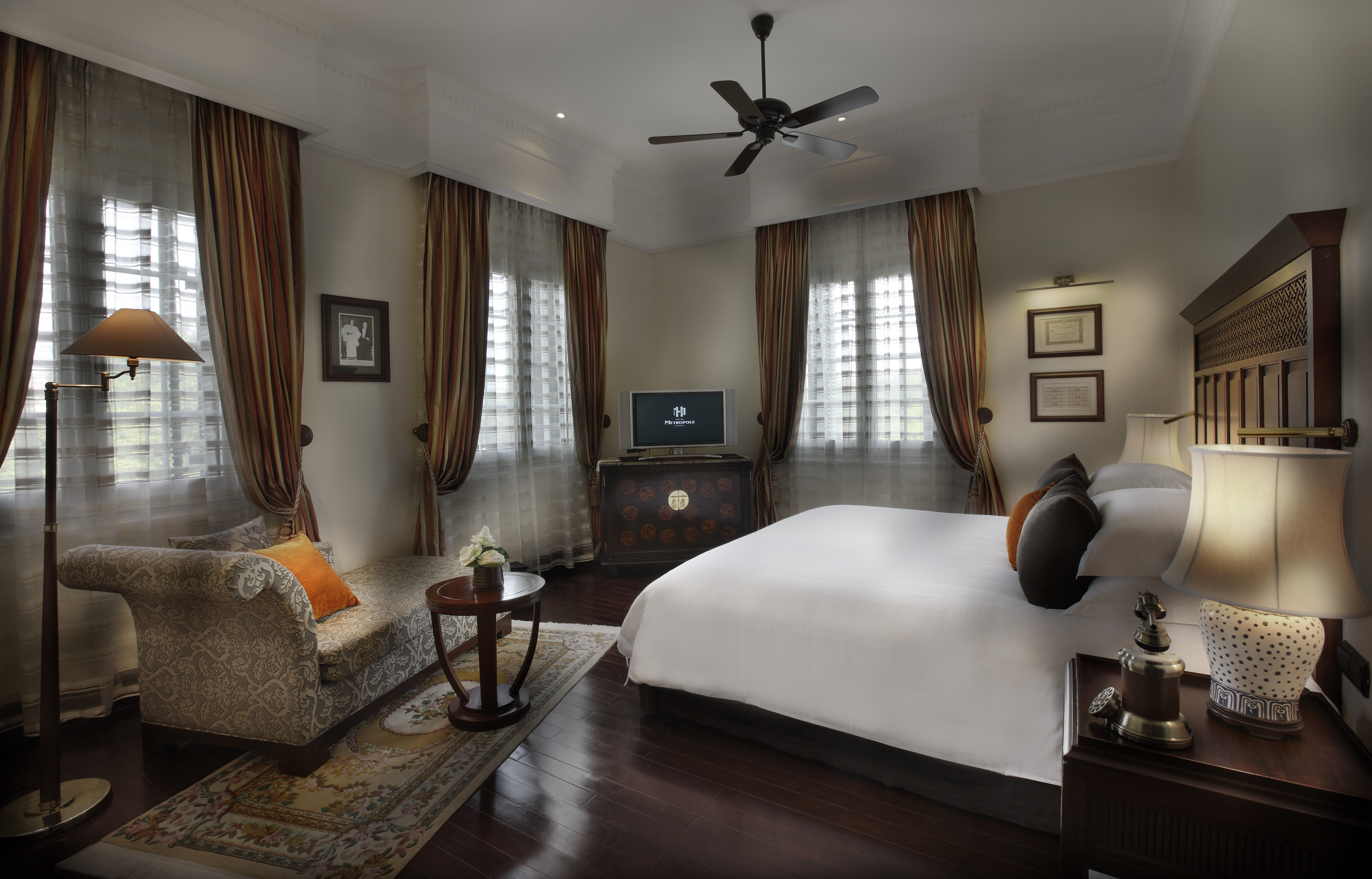 Sofitel Metropole Hanoi legendary suite, double bed, sofa, grand decor