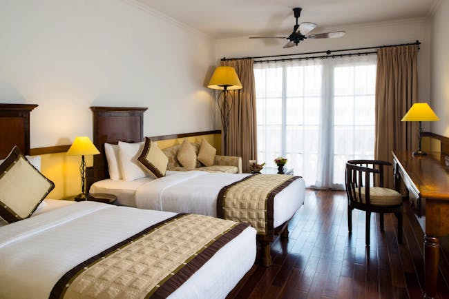 Victoria Can Tho Resort twin superior guestroom, beds, large window, traditional decor