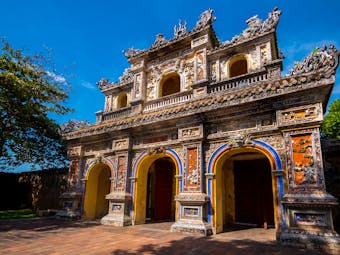 Chuong Duc Gate in Hue, traditional architecture, intricate carving and paintings