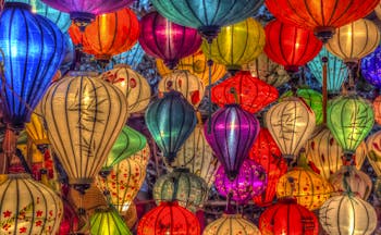 Lanterns for sale in Vietnam, multicoloured and intricate designs, traditional paper lanterns