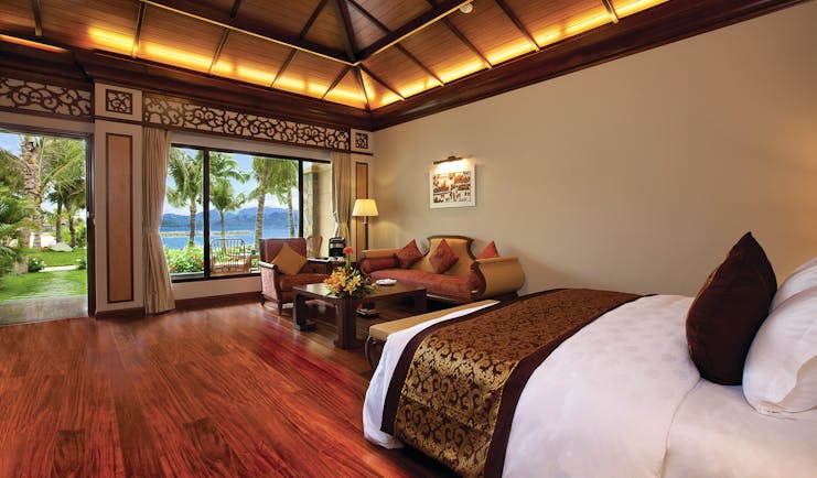Vinpearl Luxury Nha Trang Vietnam beach front guest room bed sofa modern décor