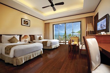 Vinpearl Luxury Nha Trang Vietnam grand deluxe room twin beds access to terrace ocean views