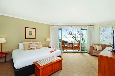 Anchorage Port Stephens New South Wales and Sydney bedroom with sofa and doors to balcony
