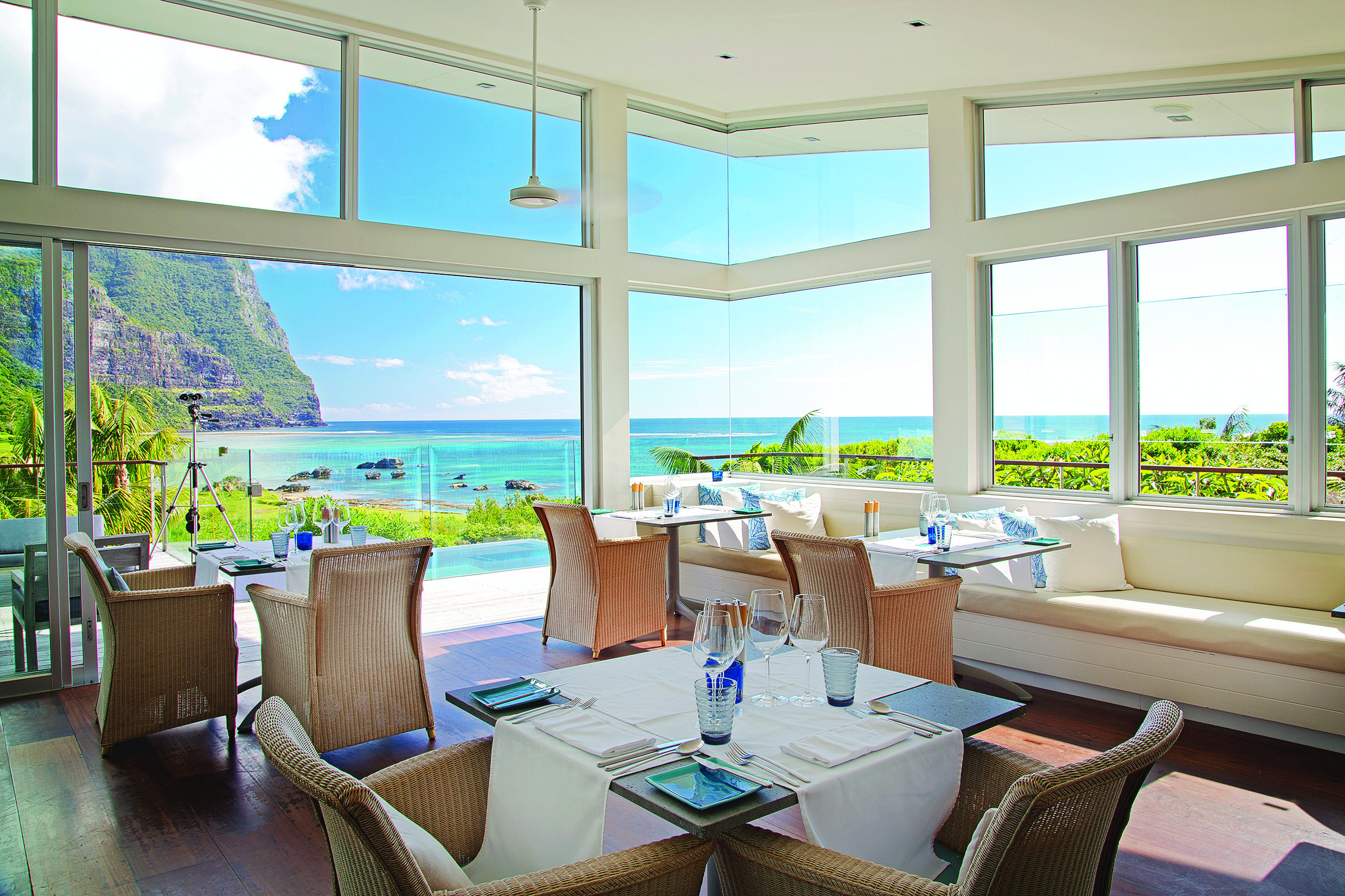 Capella Lodge restaurant, elegant and modern interiors, views overlooking bay and mountains
