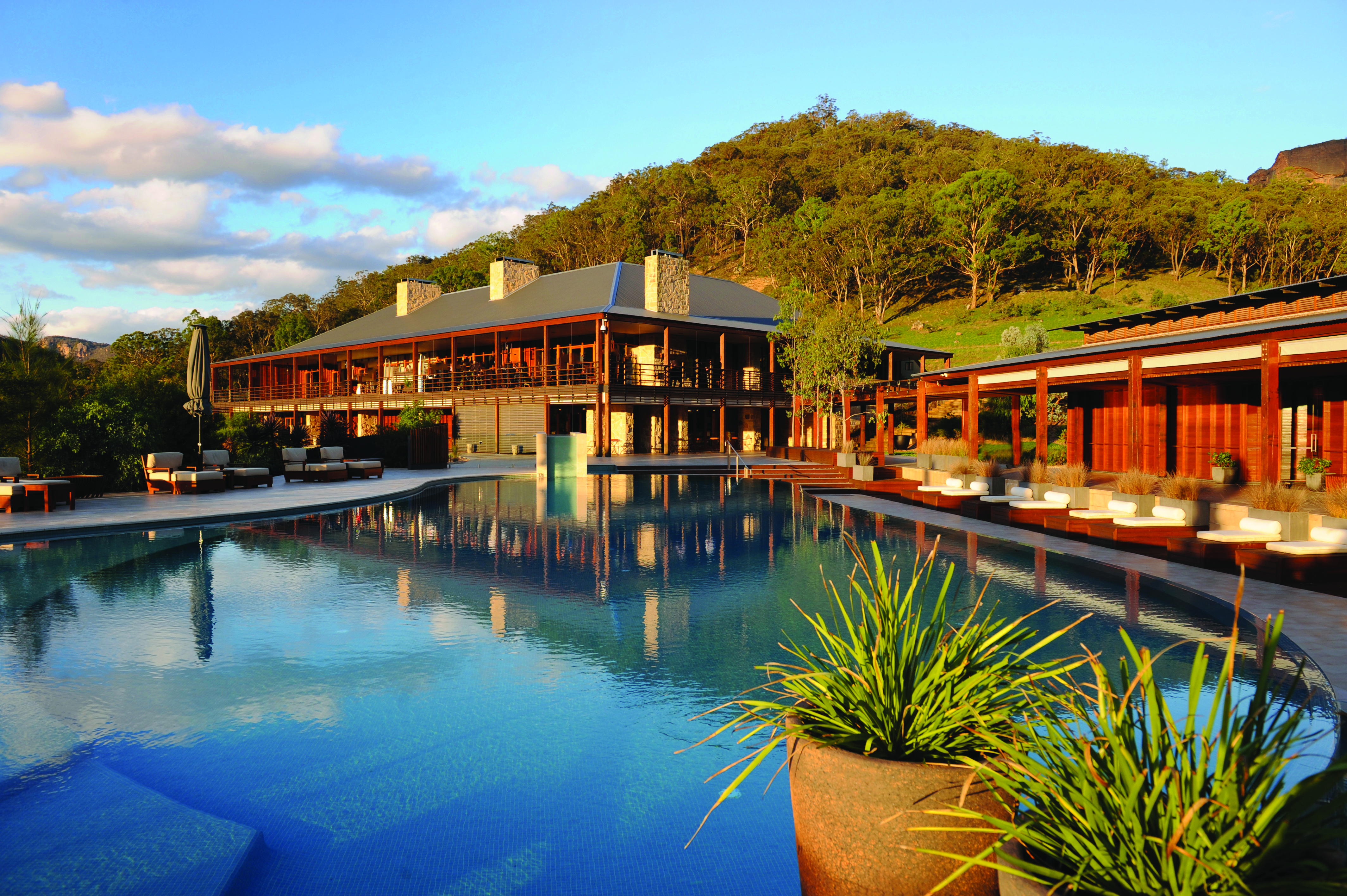 Main outdoor pool with exterior of hotel in the background