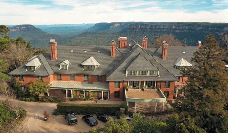 Lilianfels New South Wales exterior red brick building with grey roof and view of rock plateau