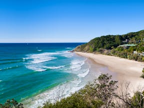 Byron Bay beach in Australia sand cliffs and sea