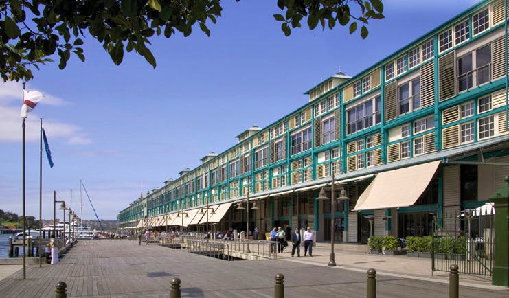 Ovolo Woolloomooloo Sydney exterior view of building with turquoise detailing