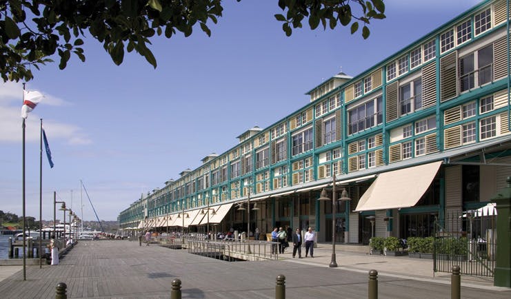 Ovolo Woolloomooloo Sydney exterior view of building with turquoise detailing