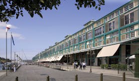 Ovolo Woolloomooloo Sydney exterior view of building with turquoise detailing