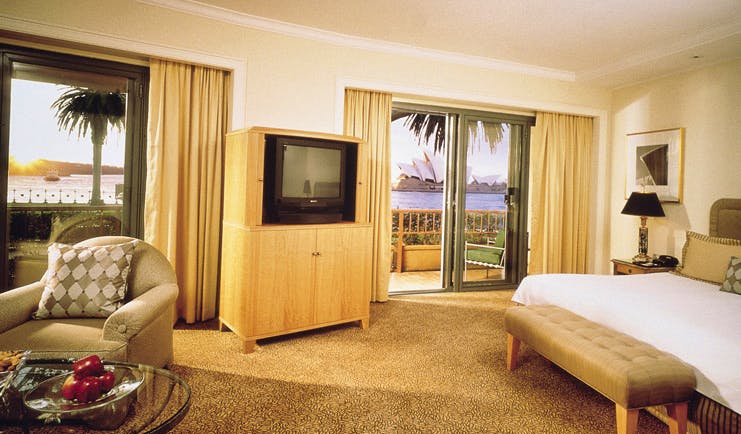 Park Hyatt Sydney bedroom terrace with armchair with view of Sydney opera house
