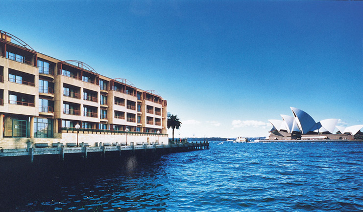 Park Hyatt Sydney opera house building with large windows overlooking Sydney opera house