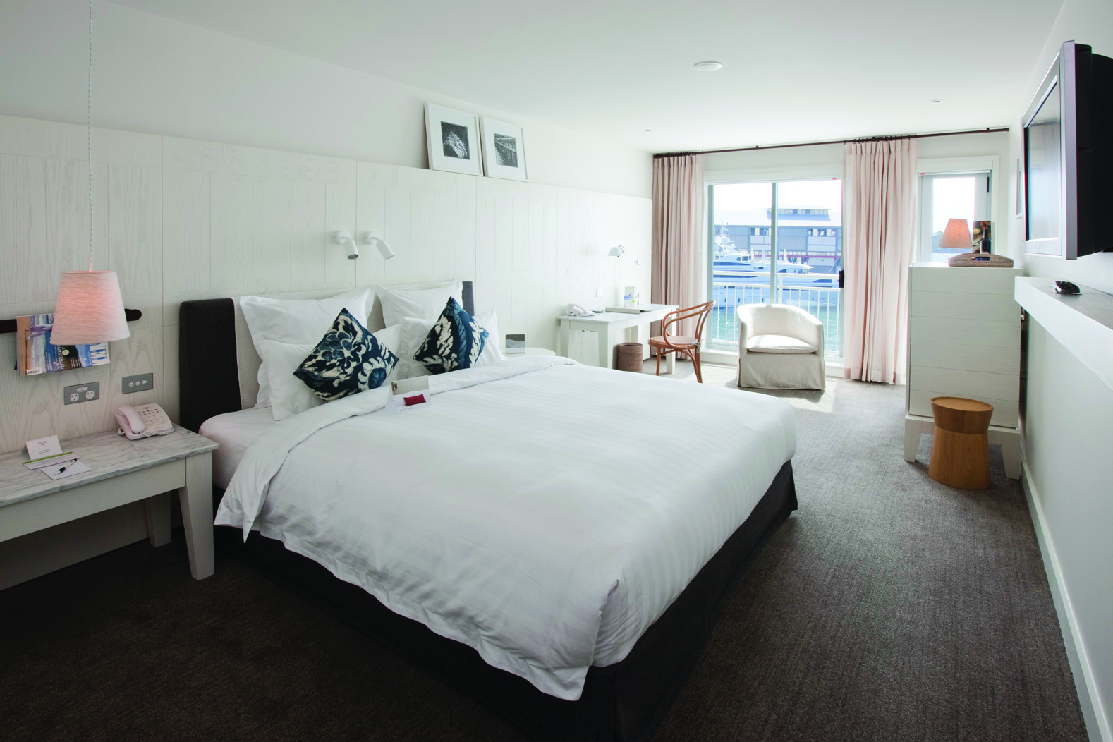 Pier One waterside room, king size bed, elegant decor, balcony overlooking harbour