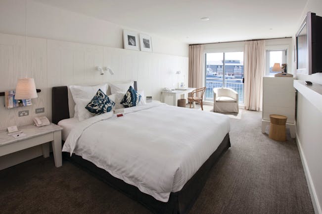 Pier One waterside room, king size bed, elegant decor, balcony overlooking harbour