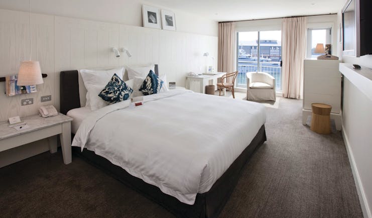 Pier One waterside room, king size bed, elegant decor, balcony overlooking harbour