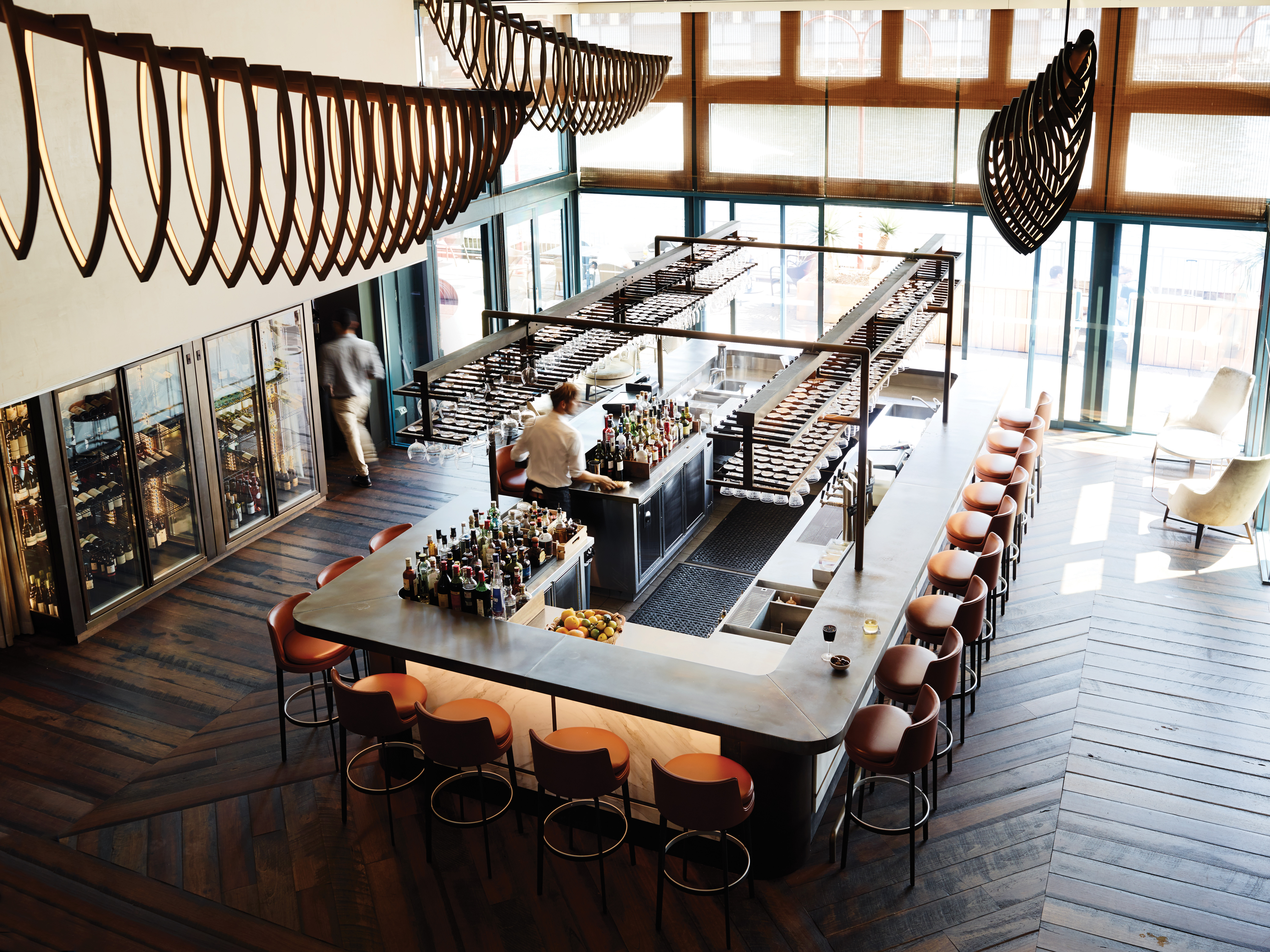 Bar area with high stools around the rectangular bar 