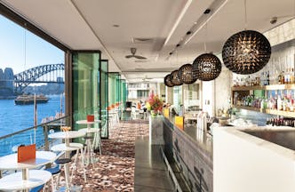 Pullman Grand Quay Sydney bar daytime with view of harbour bridge