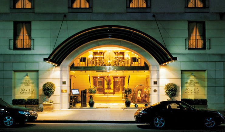 The Langham Sydney exterior white building with large glass entrance