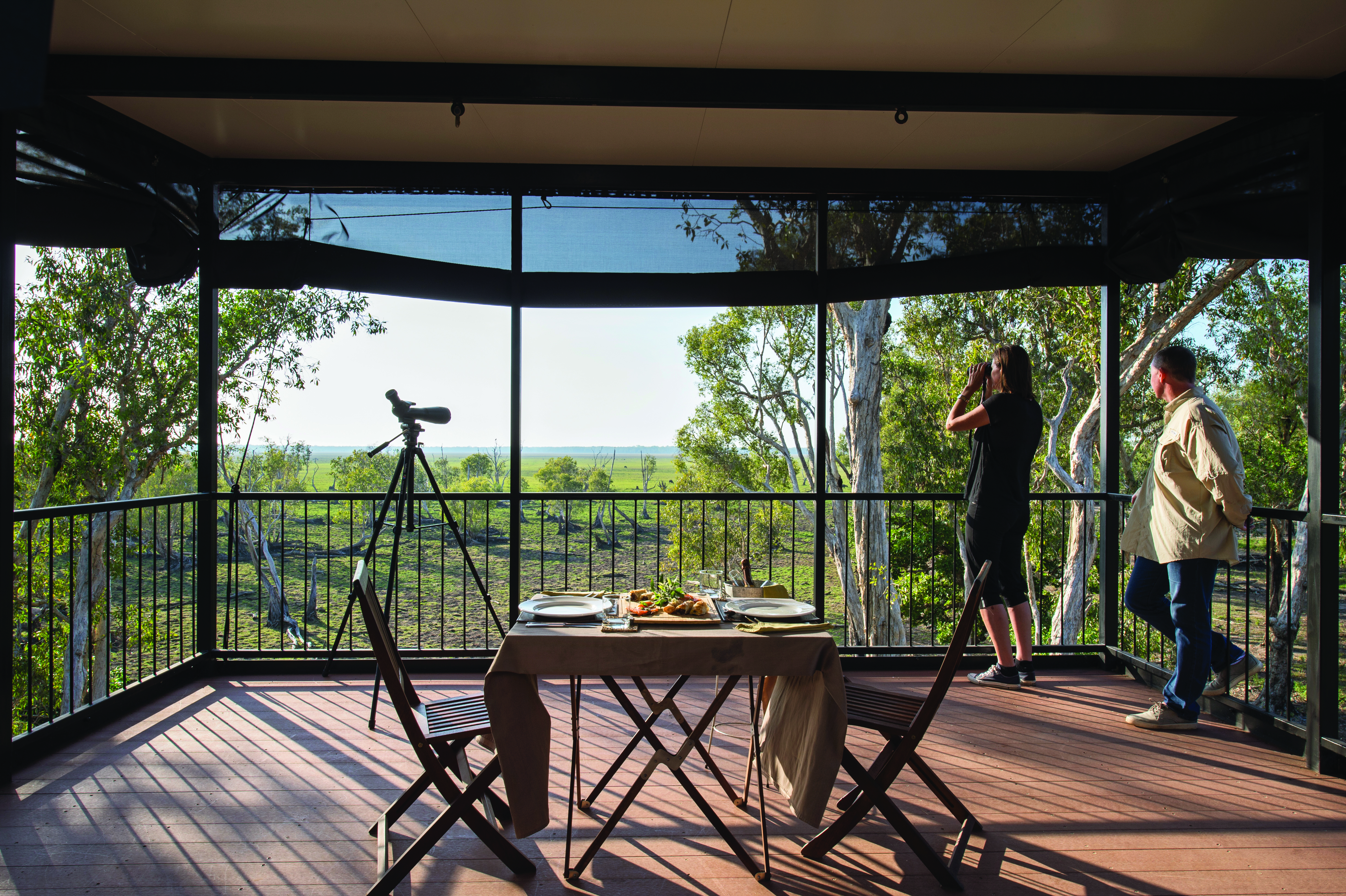 Bamurru Plains lodge terrace, outdoor dining area and nature viewing area, view of outback