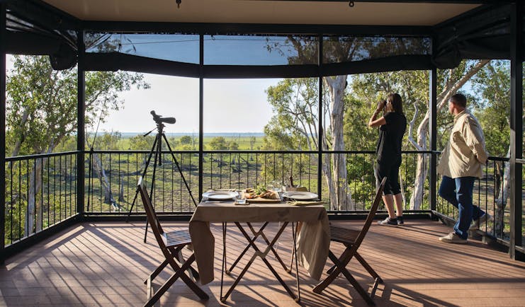 Bamurru Plains lodge terrace, outdoor dining area and nature viewing area, view of outback