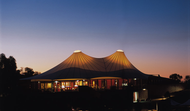 Longitude 131 Ayers Rock exterior large tent like building with floor to ceiling windows
