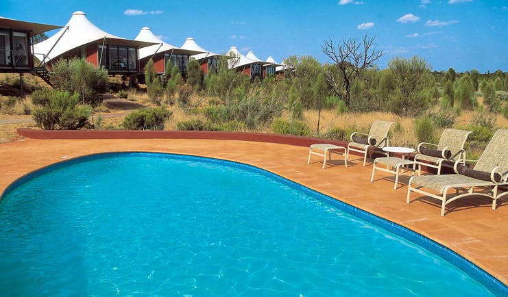 Longitude 131 Ayers Rock outdoor pool lodges overlooking outdoor pool with loungers