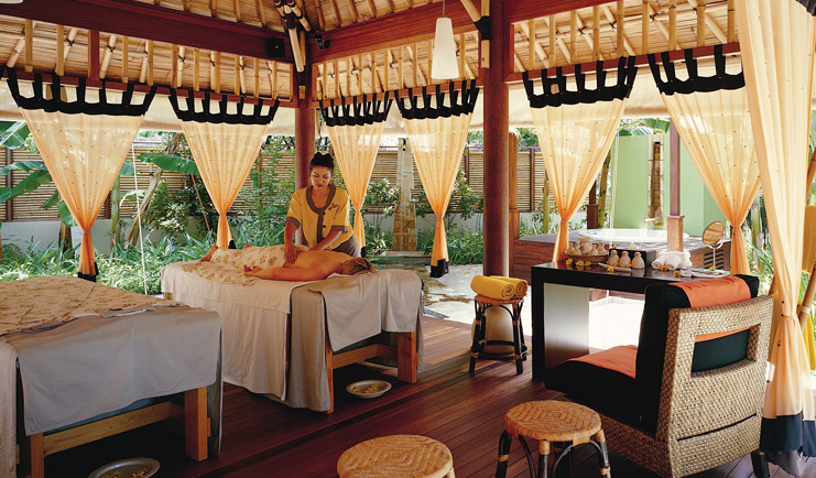 Alamanda Palm Cove Queensland spa person getting massage in covered outdoor spa