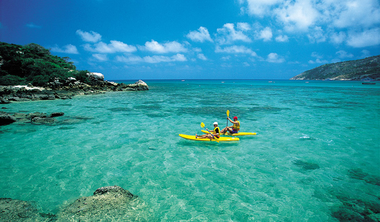 Lizard Island Queensland kayaking two people kayaking in clear blue water