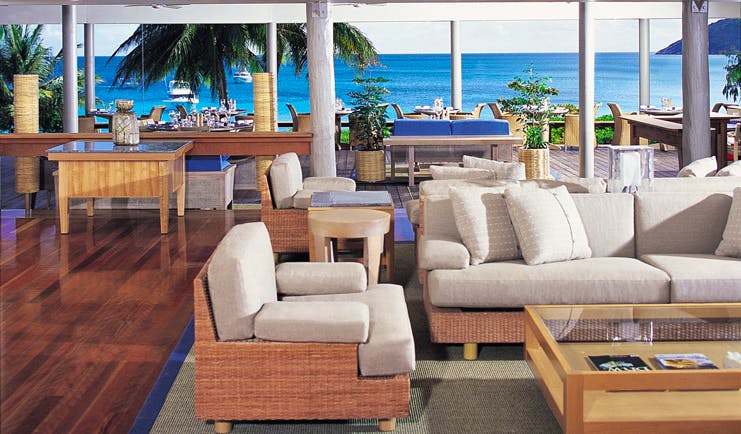 Lizard Island Queensland lounge area with sofas and sea view