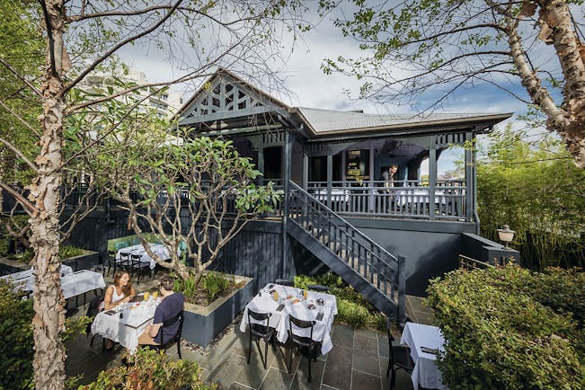 Spicers Balfour restaurant with outdoor seating area amongst trees