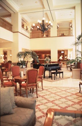 Stamford Plaza Brisbane Queensland lobby with seating area and grand piano