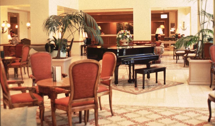Stamford Plaza Brisbane Queensland lobby with seating area and grand piano