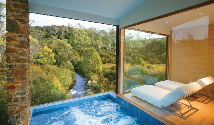 Cradle Mountain Lodge Tasmania pool view private swimming pool with view of river and loungers