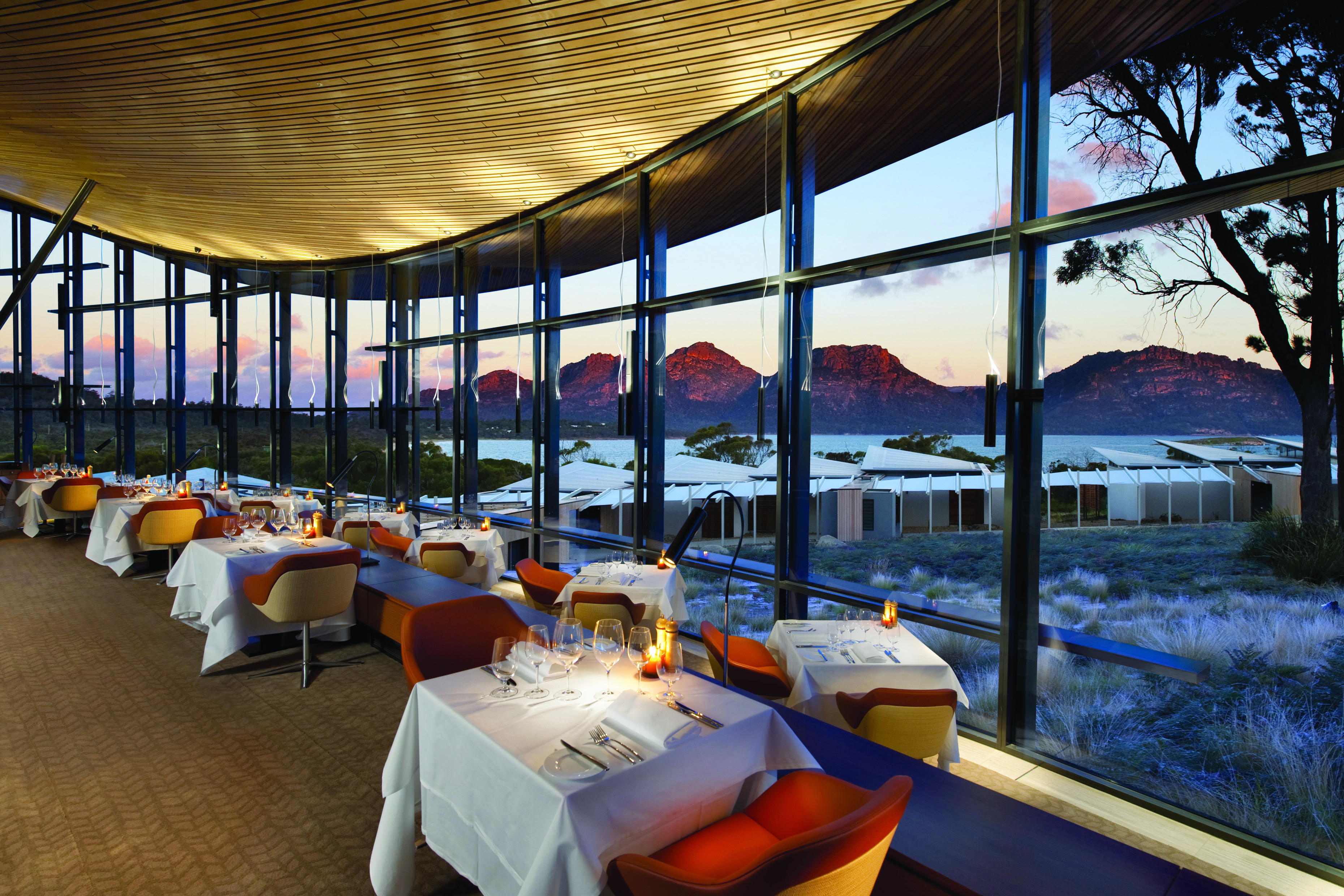 Saffire Freycinet Tasmania dining restaurant with floor to ceiling windows and mountain view