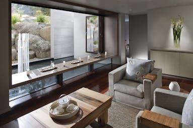 Saffire Freycinet Tasmania spa lounge area with tea set and fountain view