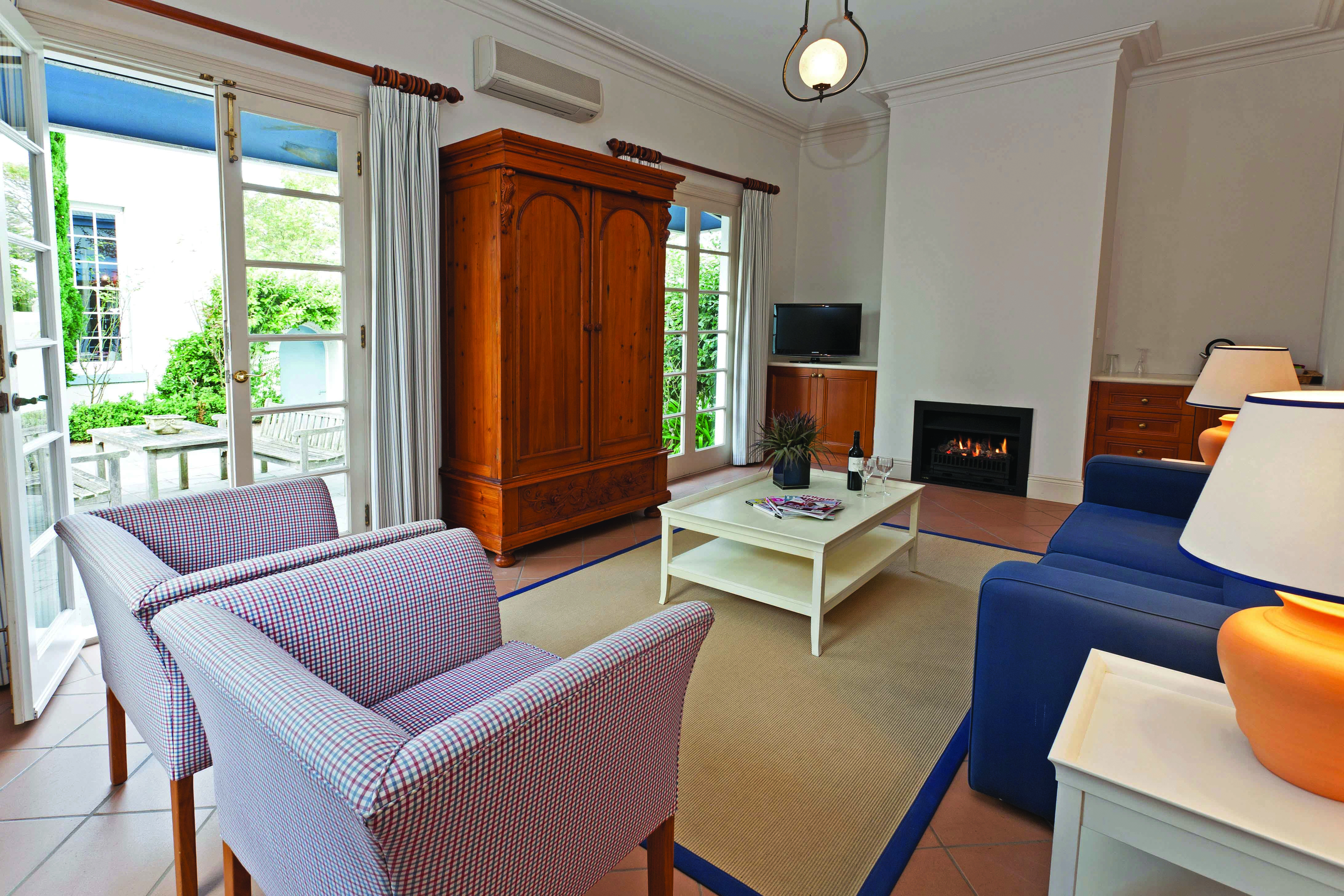 Oscars Waterfront Boutique Hotel Victoria and Melbourne courtyard suite lounge area and patio