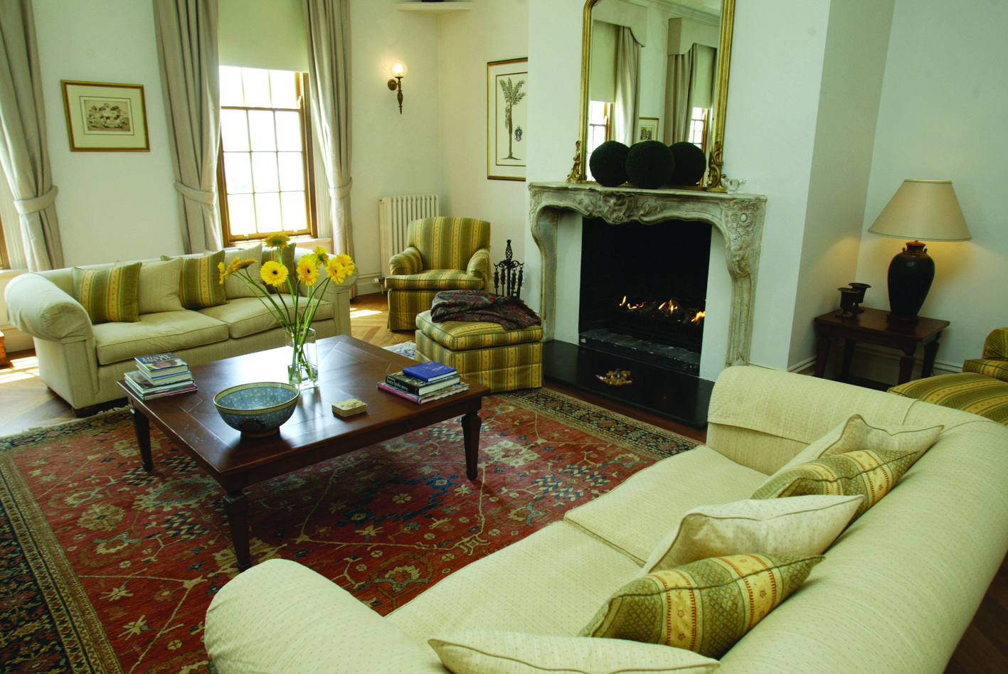 Oscars Waterfront Boutique Hotel Victoria and Melbourne drawing room with sofas and fireplace