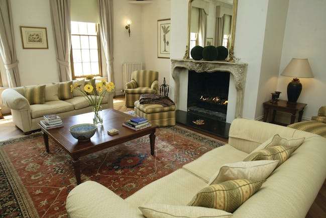 Oscars Waterfront Boutique Hotel Victoria and Melbourne drawing room with sofas and fireplace