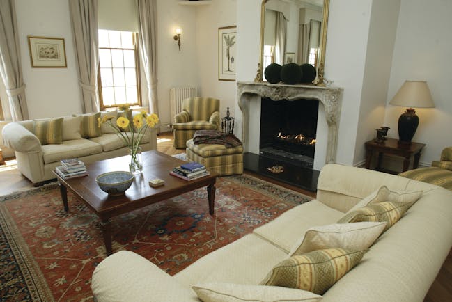 Oscars Waterfront Boutique Hotel Victoria and Melbourne drawing room with sofas and fireplace