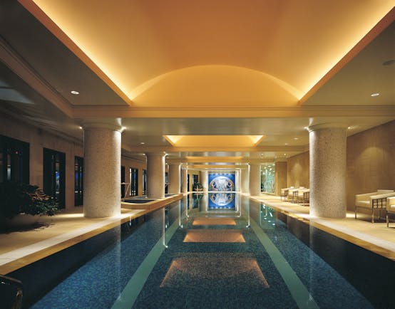 Park Hyatt Melbourne indoor swimming pool with columns and loungers