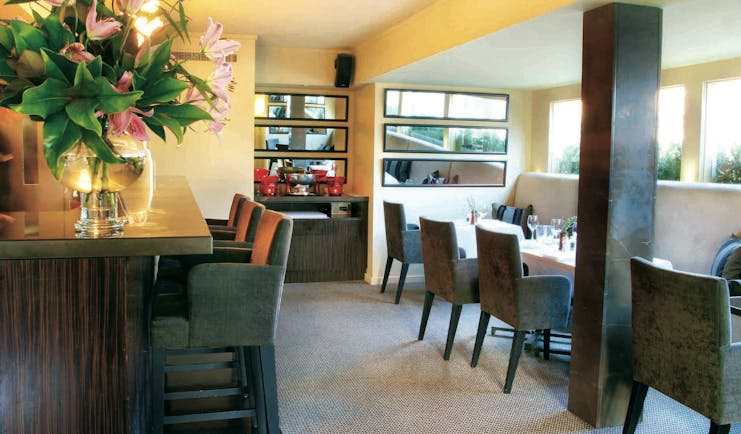 The Lyall Hotel Melbourne bistro bar restaurant and bar area with large windows and mirrors