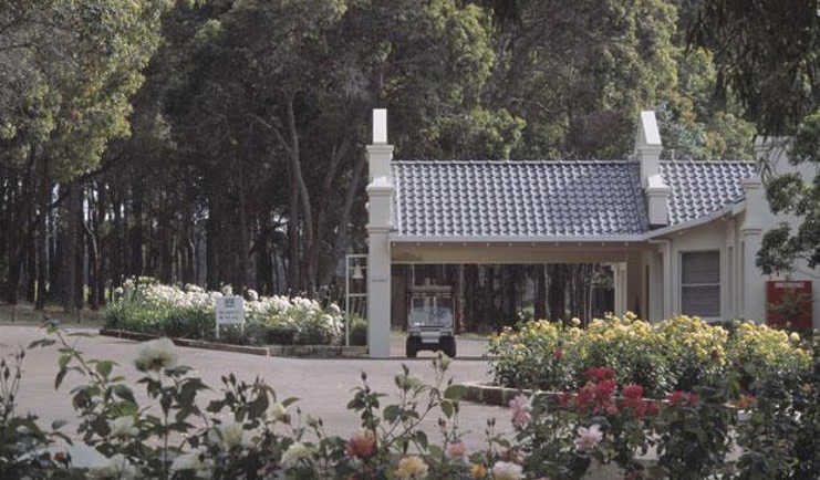 Cape Lodge Western Australia lodge exterior view of lodge with golf cart