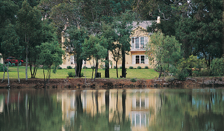 Cape Lodge Western Australia terrace suites view yellow building overlooking trees and a creek
