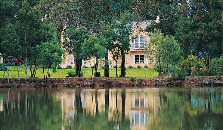 Cape Lodge Western Australia terrace suites view yellow building overlooking trees and a creek
