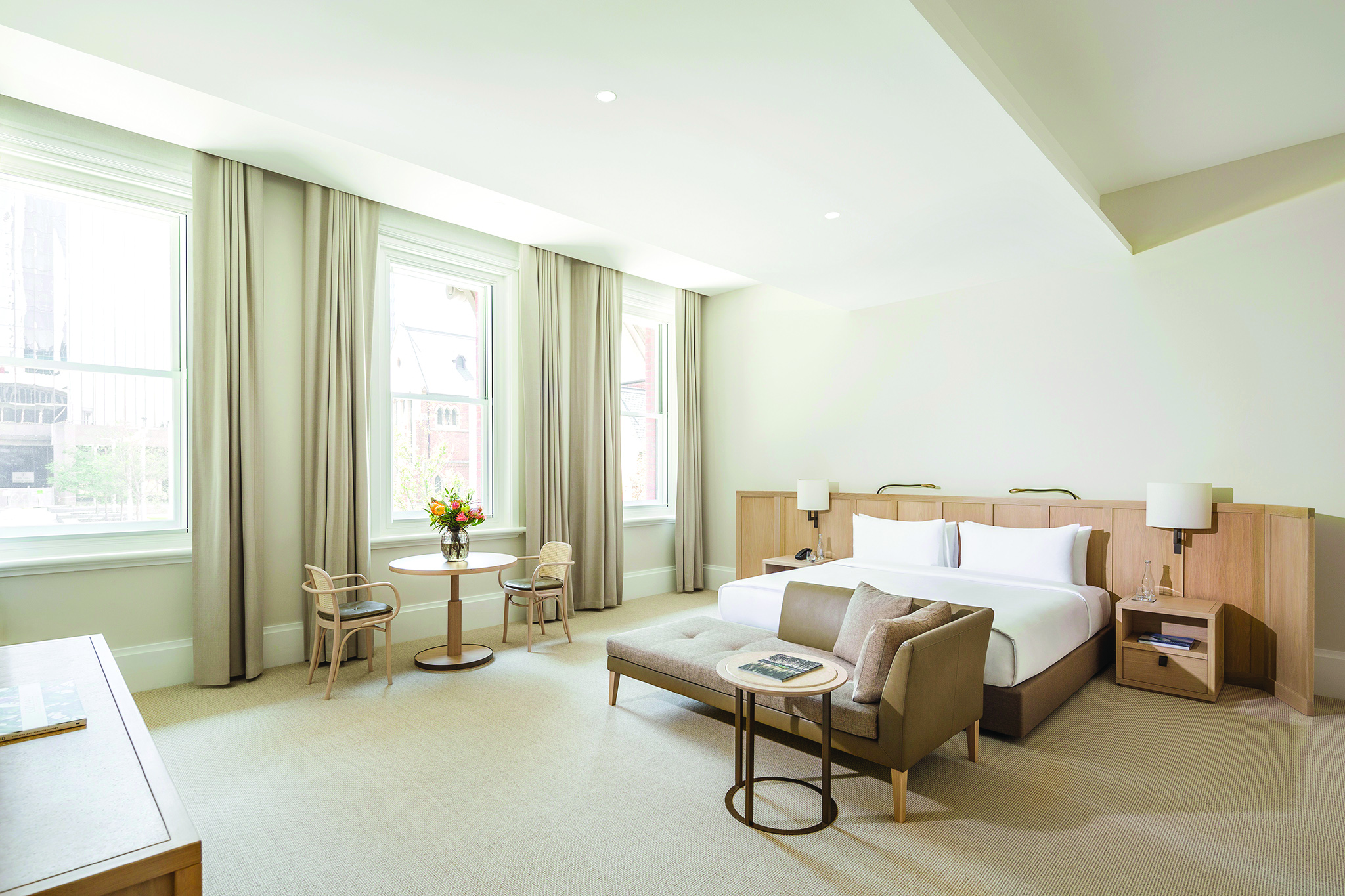 COMO The Treasury heritage room, double bed, desk, crisp white decor