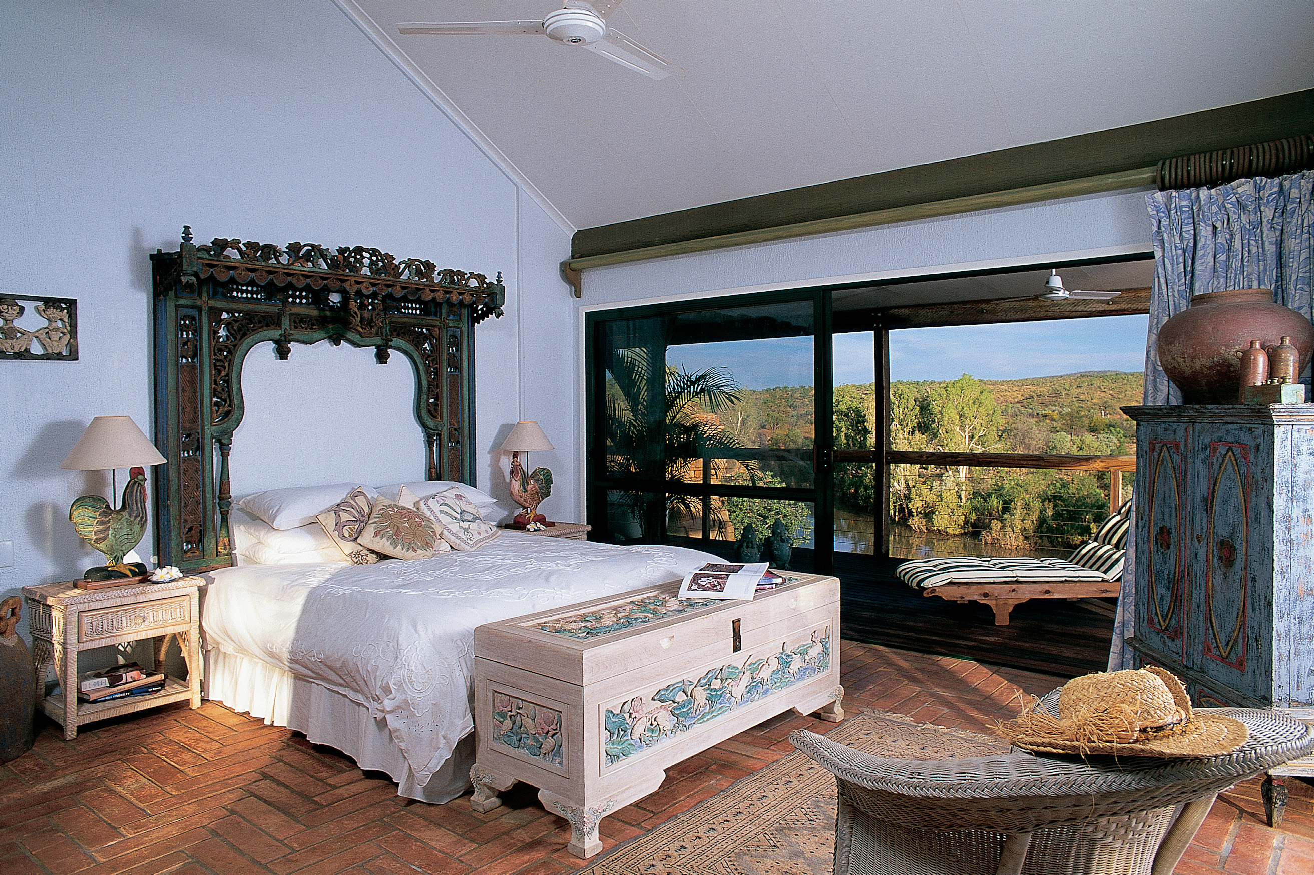 El Questro Western Australia bedroom with antique furniture and patio door to balcony 